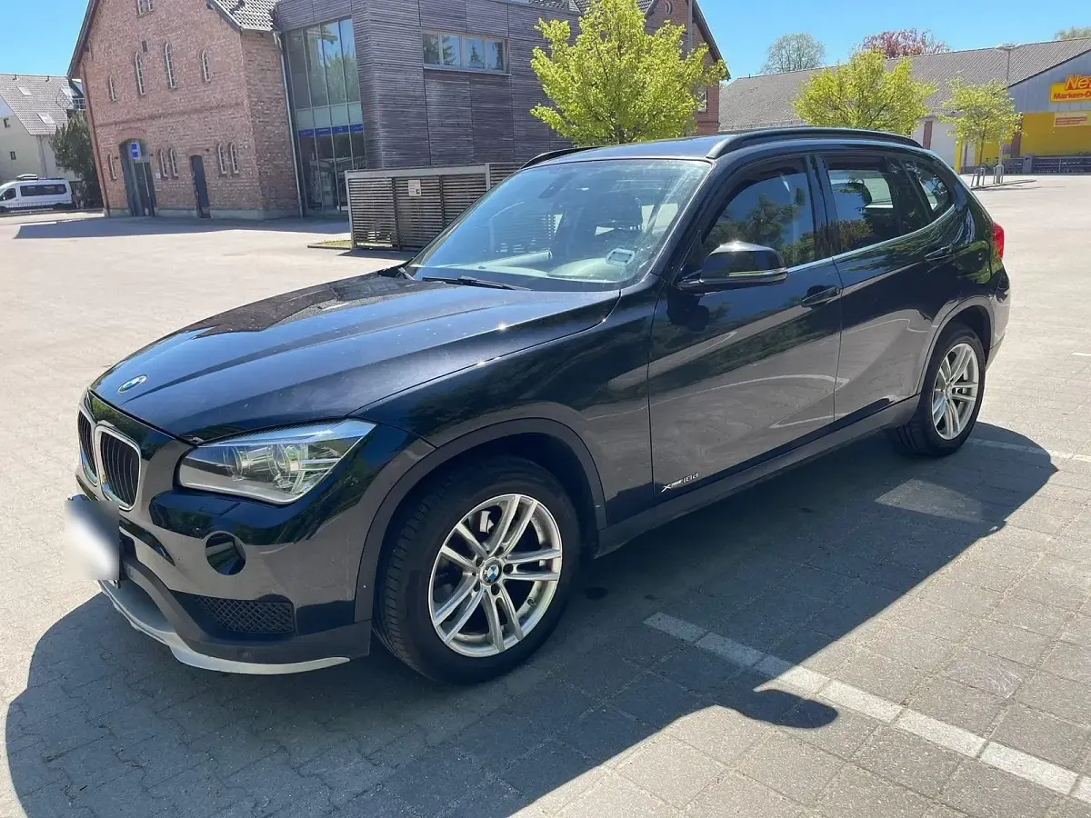 Second-hand BMW X1 143 CP (105 kW) 2014 Negru SUV