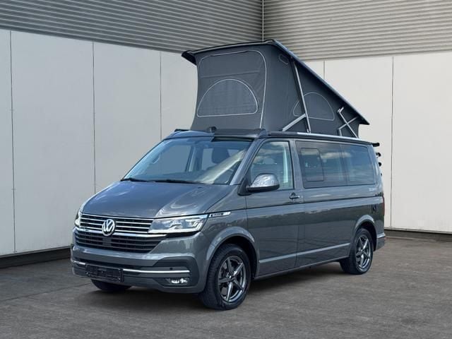 Indiumgrau metallic/grau Gebraucht 2024 VW T6.1 California Van | 62.723 € (Superpreis) - Bild 1/4