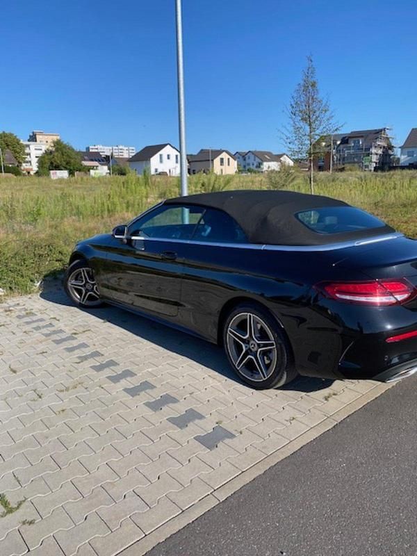 Schwarz Gebraucht 2020 Mercedes C200 AMG Cabrio | 32.999 € (Fairer Preis) - Bild 1/4