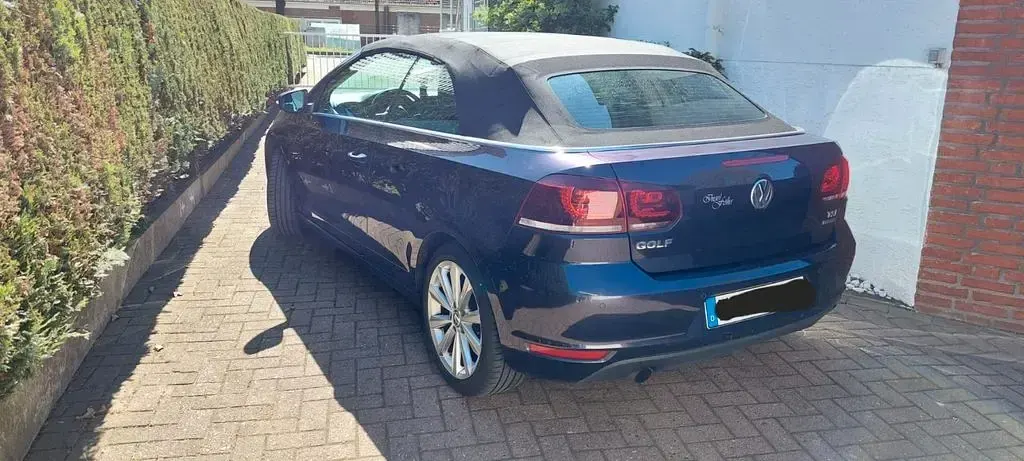 Używany VW Golf 105 KM (77 kW) 2011 Purpurowy Kabriolet