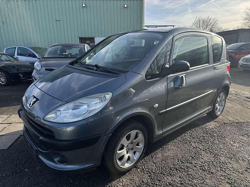 Grau Gebraucht 2006 Peugeot 1007 Filou Van / Kleinbus | 1.700 € (Superpreis) - Bild 1/4