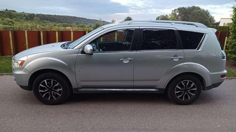 Silber grau Gebraucht 2010 Mitsubishi Outlander Invite SUV | 6.999 € (Guter Preis) - Bild 1/4