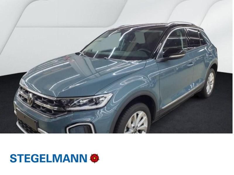 Petroleum blue metallic Gebraucht 2024 VW T-Roc Style SUV | 29.190 € (Fairer Preis) - Bild 1/4