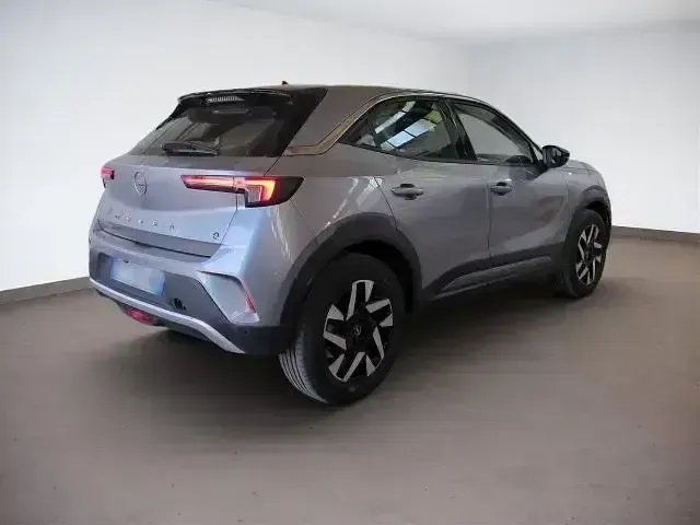Gebraucht Opel Mokka-e Elegance 100 kW (136 PS) 2022 Quarz grau metallic SUV