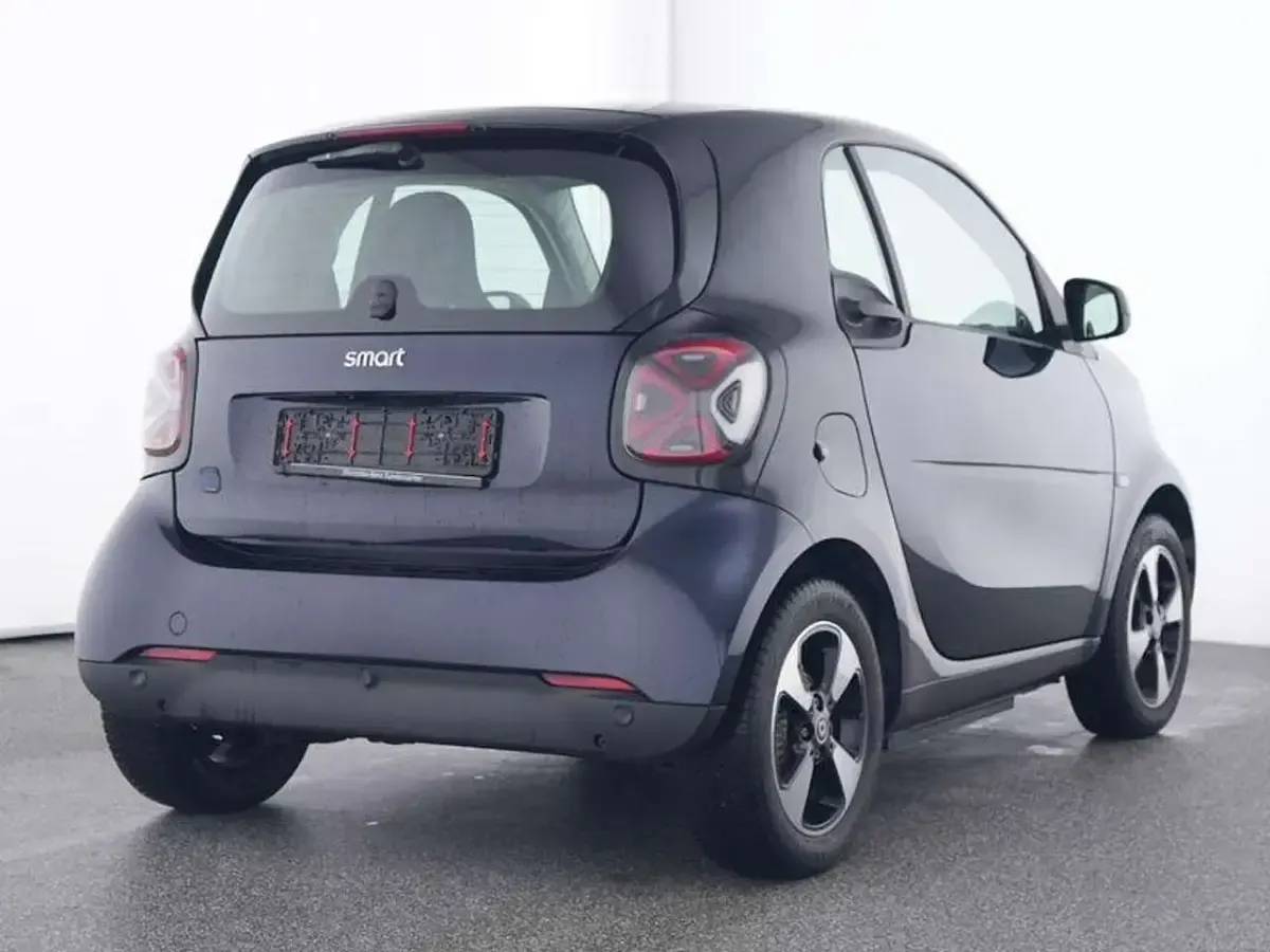 Gebraucht Smart ForTwo Coupé Exclusive 60 kW (82 PS) 2024 Bodypanels in sapphire blue (metallic) Kleinwagen