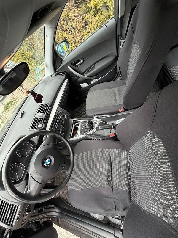 Gebraucht BMW 116 116 PS (85 kW) 2006 Schwarz Kleinwagen