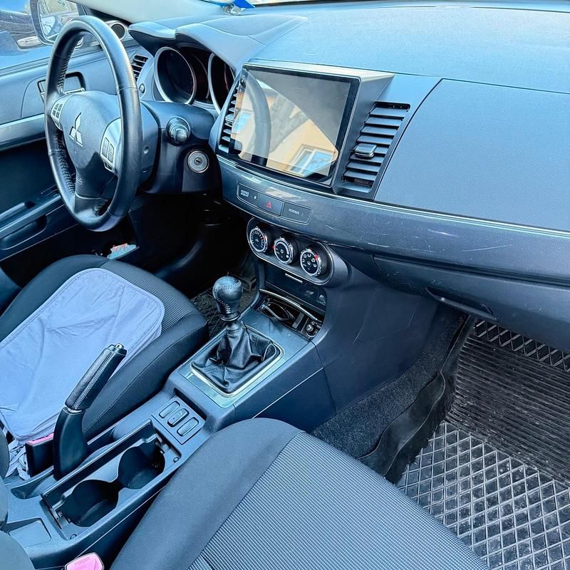 Gebraucht Mitsubishi Lancer 150 PS (110 kW) 2011 Schwarz Limousine