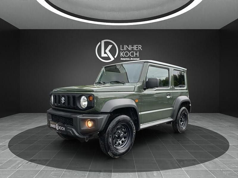 Grün Gebraucht 2024 Suzuki Jimny Comfort SUV | 30.490 € (Fairer Preis) - Bild 1/4