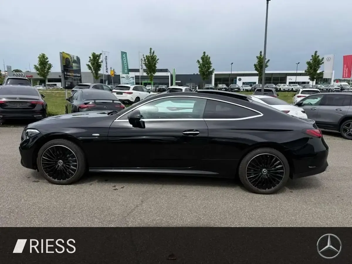 Gebraucht Mercedes CLE300 AMG 313 PS (230 kW) 2024 Metalliclack obsidianschwarz Coupé