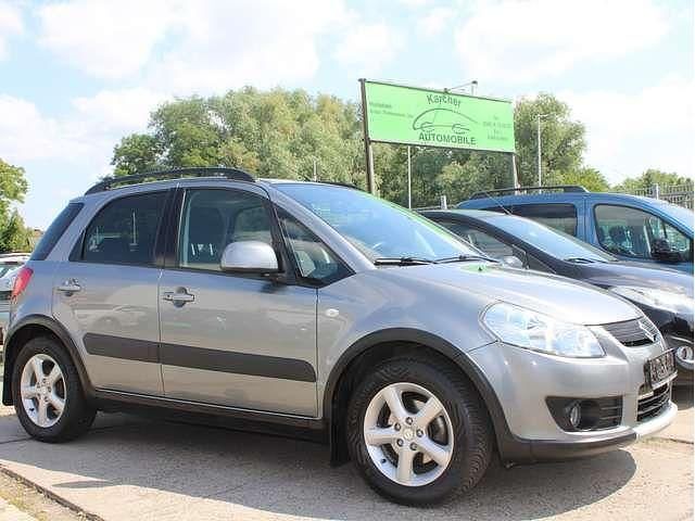 Grau Gebraucht 2009 Suzuki SX4 Club SUV | 5.500 € (Fairer Preis) - Bild 1/4