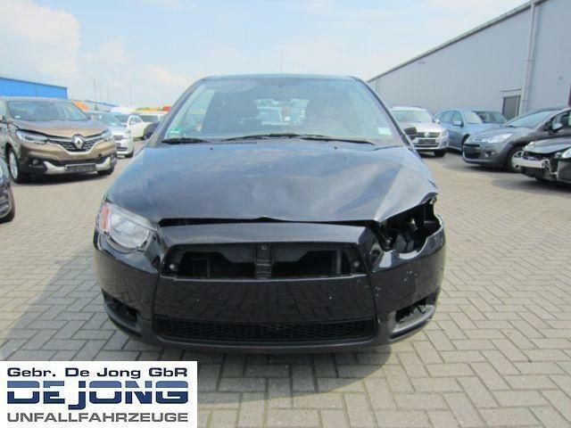 Second-hand Mitsubishi Colt 95 CP (69 kW) 2011 Negru Berlinǎ