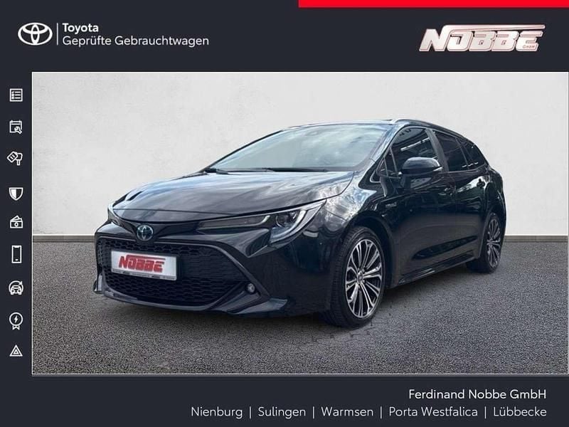 Mysticschwarz mica Gebraucht 2021 Toyota Corolla Team Kombi | 23.990 € (Guter Preis) - Bild 1/4