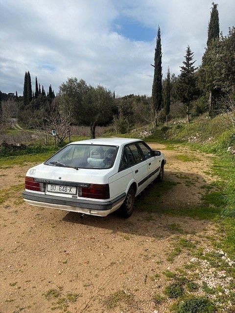Second-hand Mazda 626 63 CP (46 kW) 1987 Alb Berlinǎ