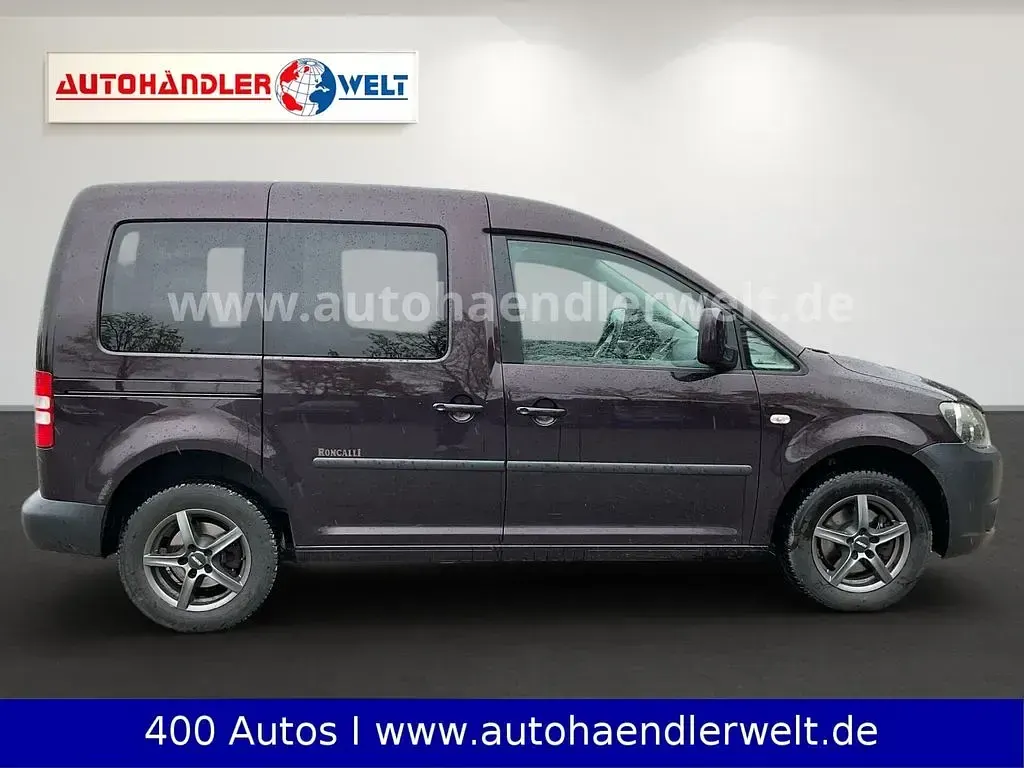 Używany VW Caddy 105 KM (77 kW) 2011 Purpurowy Minivan