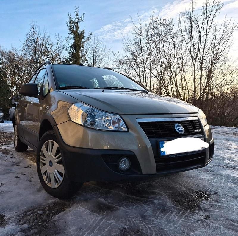 Grau Gebraucht 2009 Fiat Sedici SUV | 3.300 € - Bild 1/4
