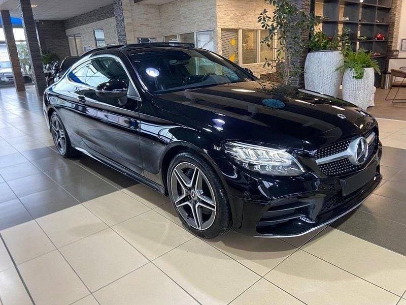 Schwarz Gebraucht 2023 Mercedes C300 AMG line Coupé | 41.900 € (Superpreis) - Bild 1/4
