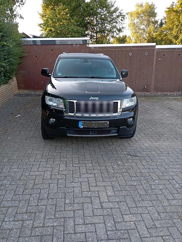 Schwarz Gebraucht 2011 Jeep Grand Cherokee Overland SUV | 9.999 € (Fairer Preis) - Bild 1/4