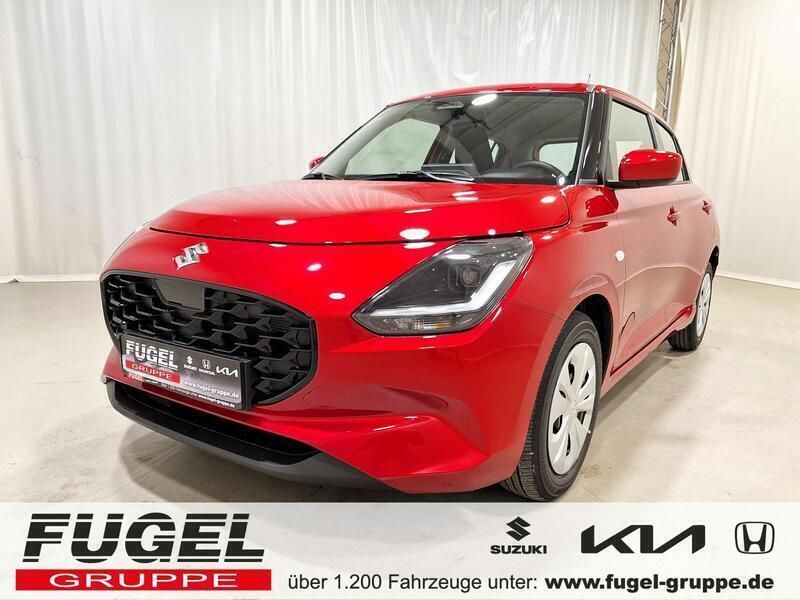 Burning red Neu 2024 Suzuki Swift Club Kleinwagen | 16.469 € - Bild 1/4