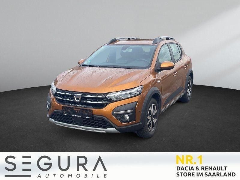 Atacamaorange Gebraucht 2022 Dacia Sandero Comfort Kleinwagen | 16.475 € (Fairer Preis) - Bild 1/4