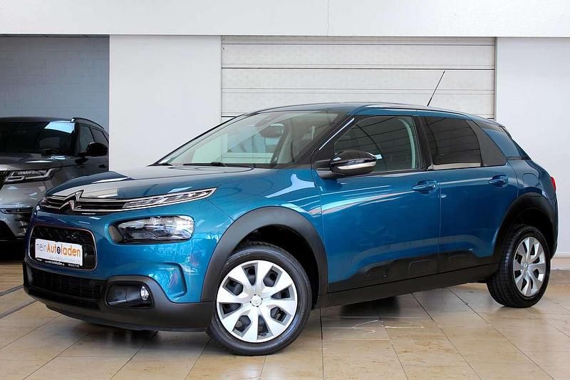 Emeraude blau metallic Gebraucht 2018 Citroën C4 Cactus PureTech Kleinwagen | 12.700 € (Fairer Preis) - Bild 1/4