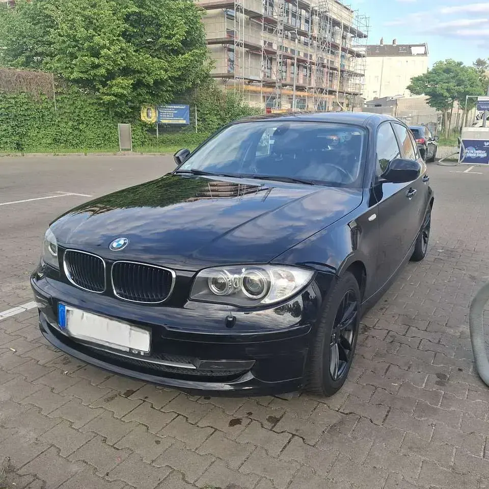 Gebraucht BMW 116 122 PS (89 kW) 2010 Schwarz Kleinwagen