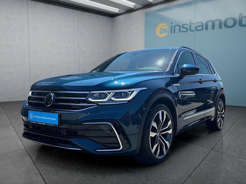 Blau Gebraucht 2024 VW Tiguan SUV | 39.449 € (Fairer Preis) - Bild 1/4