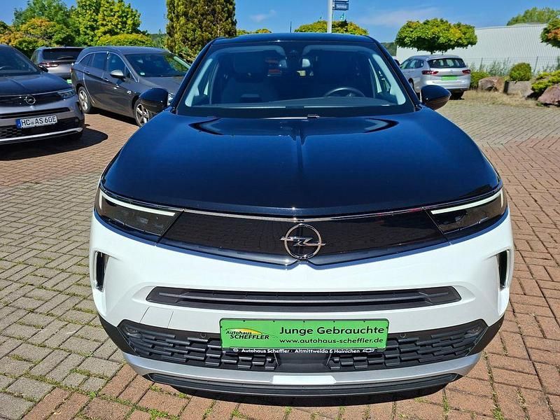 Gebraucht Opel Mokka-e Elegance 100 kW (136 PS) 2021 Jade weiss/arktis weiss SUV