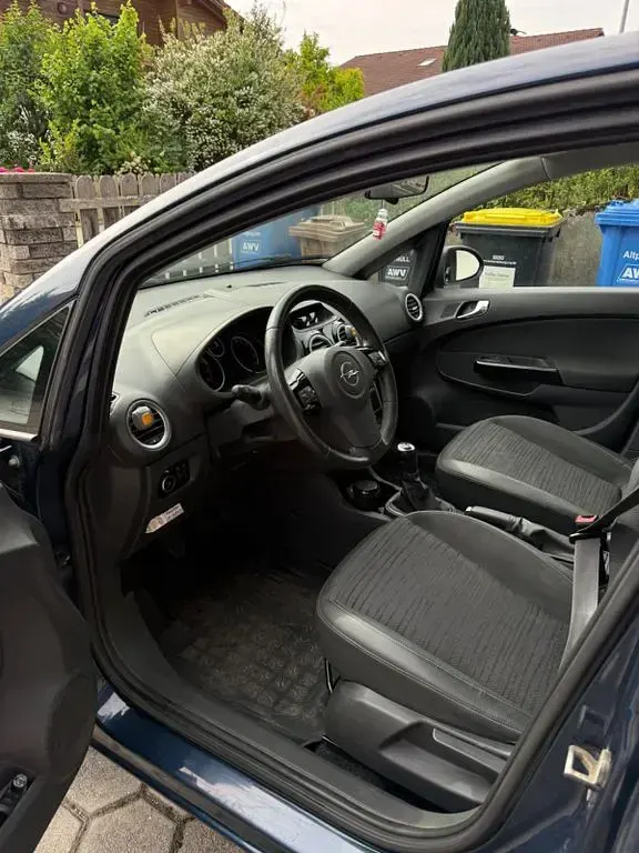 Gebraucht Opel Corsa Active 87 PS (63 kW) 2014 Blau Kleinwagen
