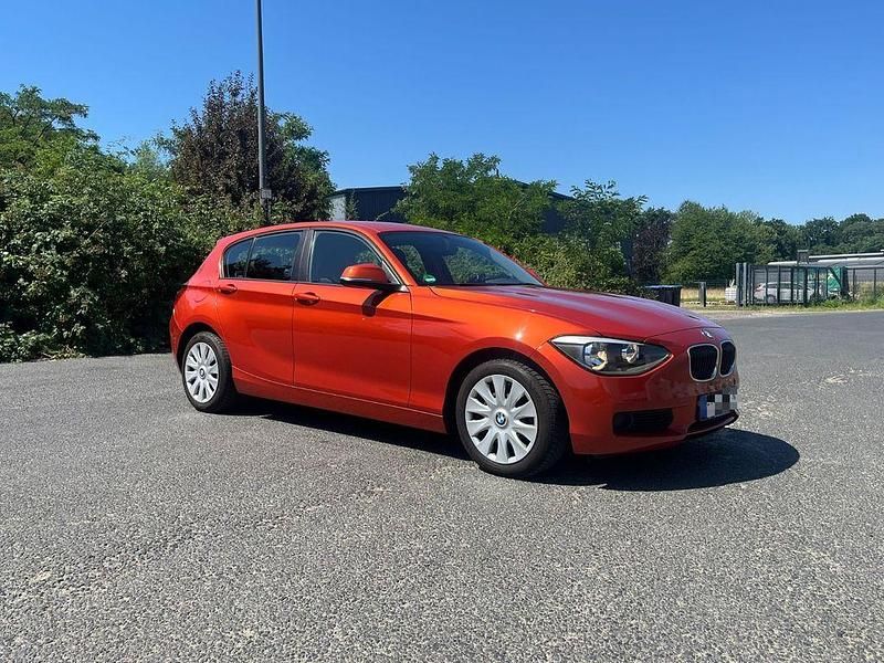 Orange Gebraucht 2012 BMW 116 Sport Line Kleinwagen | 4.650 € (Fairer Preis) - Bild 1/4