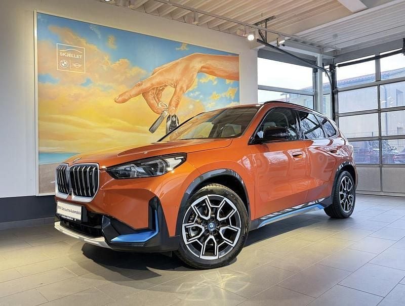 Gebraucht BMW iX1 xLine 230 kW (313 PS) 2023 Utah orange metallic SUV