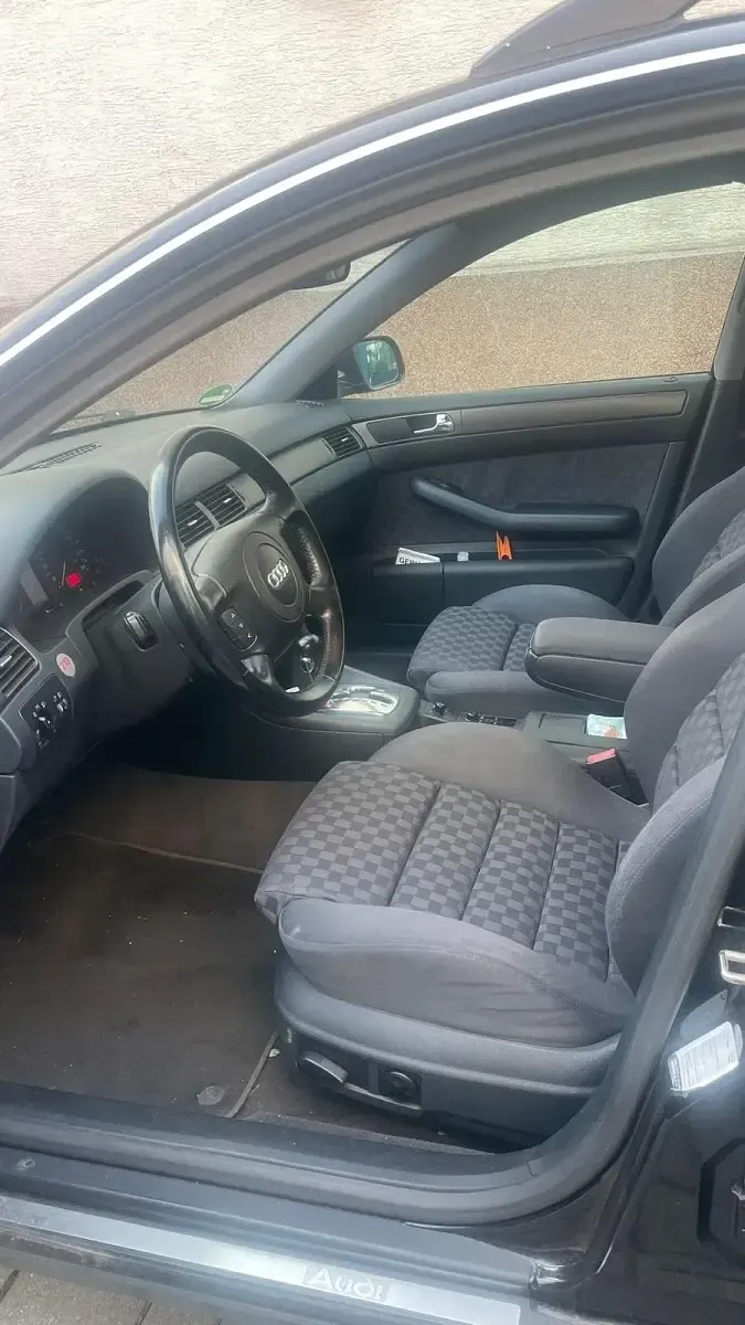 Używany Audi A6 165 KM (121 kW) 1999 Czarny Kombi