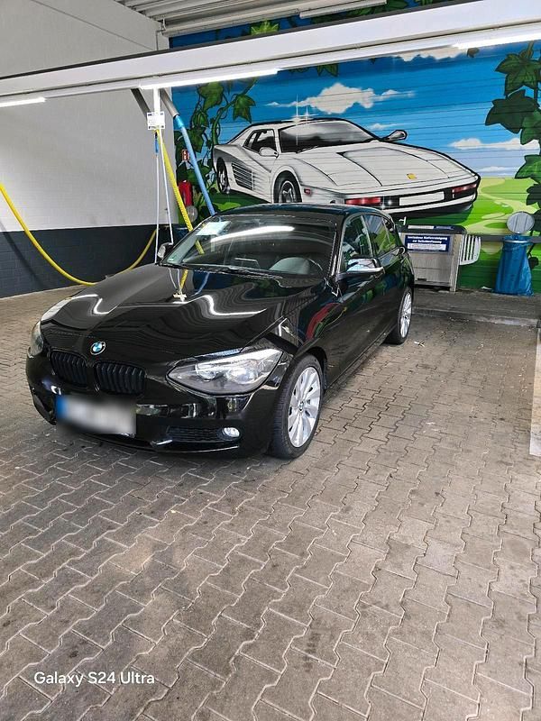 Schwarz Gebraucht 2013 BMW 114 Kleinwagen | 5.950 € - Bild 1/4