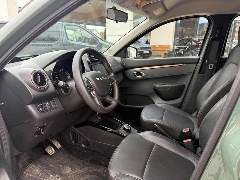 Gebraucht Dacia Spring Extreme 47 kW (65 PS) 2023 Grün flechtengrau Kleinwagen