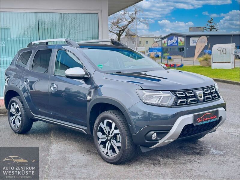 Grau Gebraucht 2022 Dacia Duster Prestige SUV | 17.475 € (Fairer Preis) - Bild 1/4