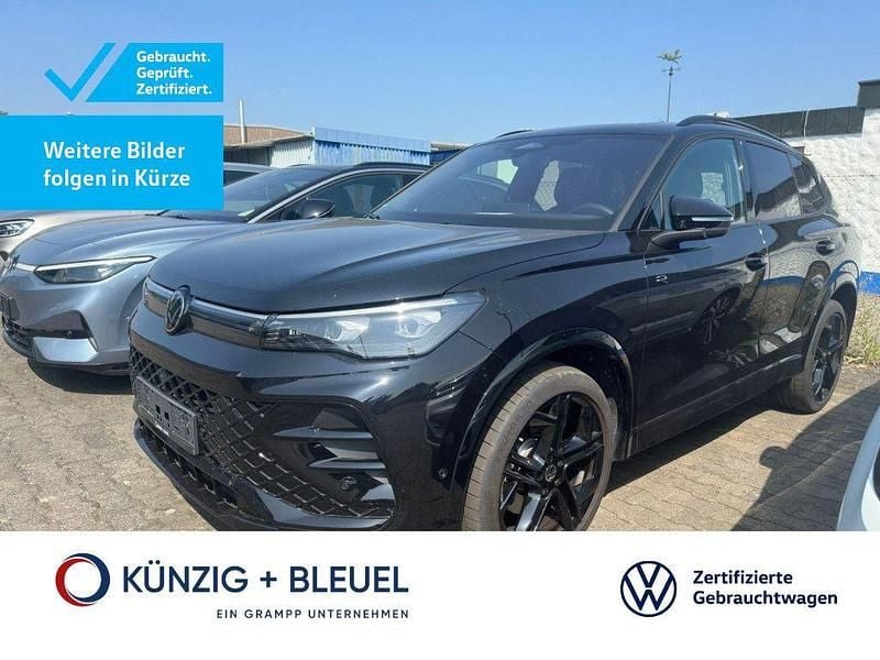 Grenadilschwarz metallic Gebraucht 2024 VW Tiguan R-line SUV | 50.380 € (Guter Preis) - Bild 1/3