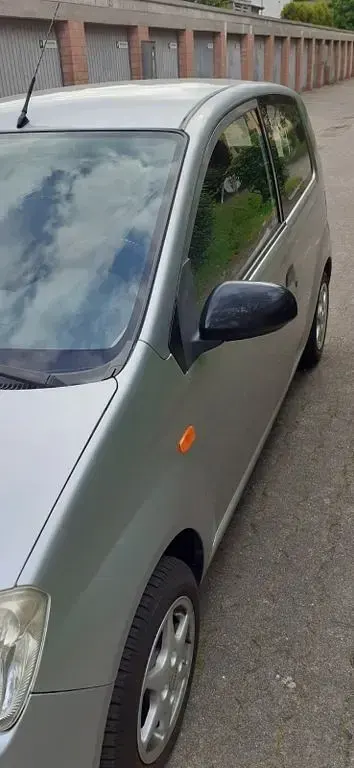 Gebraucht Daihatsu Cuore 58 PS (42 kW) 2003 Silber Kleinwagen