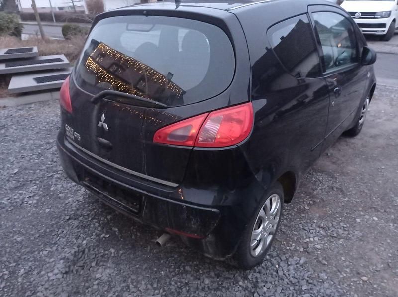 Gebraucht Mitsubishi Colt Inform 75 PS (55 kW) 2006 Schwarz Kleinwagen