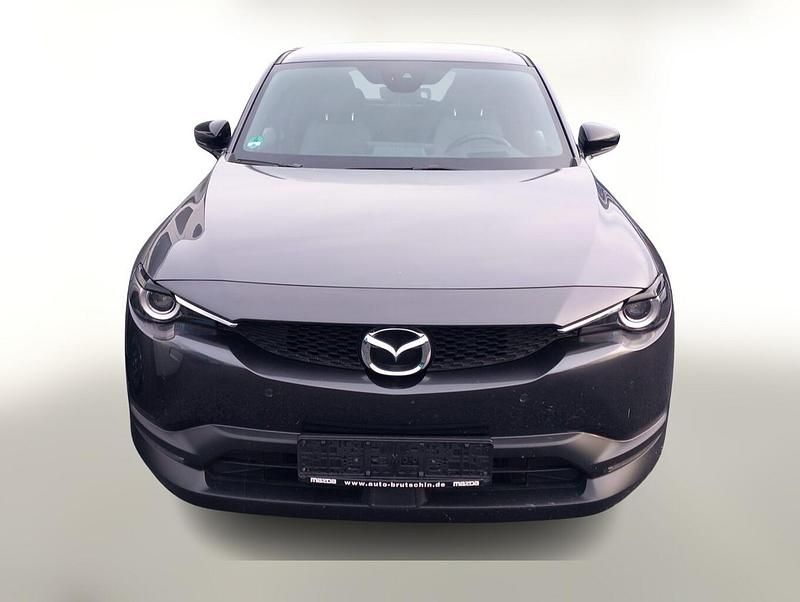 Machine grey metallic Gebraucht 2023 Mazda MX30 Prime-Line SUV | 21.975 € (Superpreis) - Bild 1/4