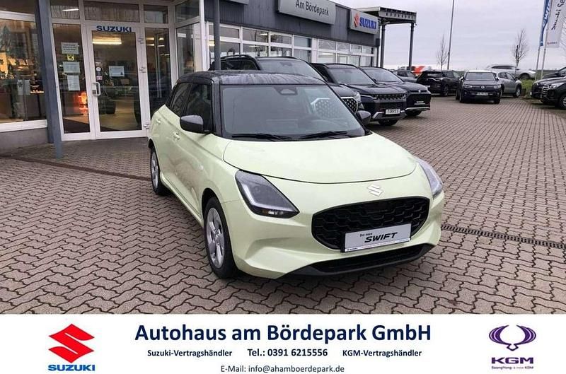 Cool yellow/mineral gray metal Neu 2025 Suzuki Swift Comfort+ Kleinwagen | 21.260 € - Bild 1/4
