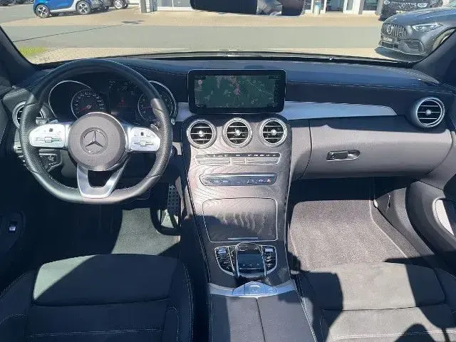 Gebraucht Mercedes C180 AMG 156 PS (114 kW) 2023 Schwarz Cabrio