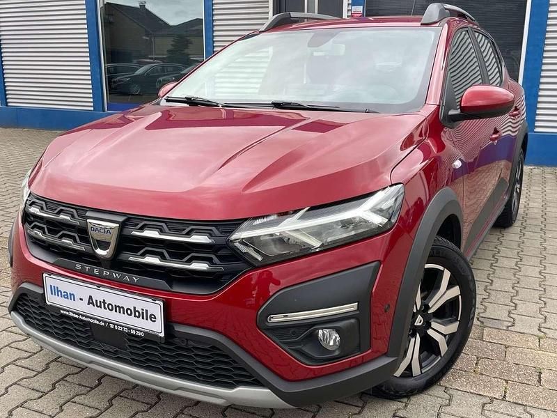 Fusionrot Gebraucht 2023 Dacia Sandero Comfort Kleinwagen | 13.450 € (Fairer Preis) - Bild 1/4