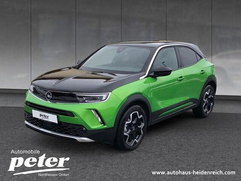Grün Gebraucht 2023 Opel Mokka-e Ultimate SUV | 21.990 € (Fairer Preis) - Bild 1/4