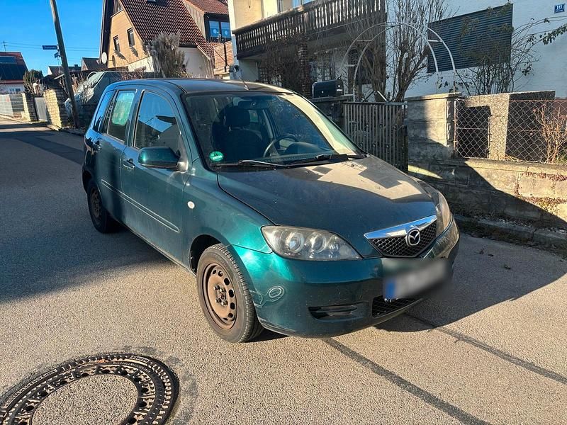 Grün Gebraucht 2007 Mazda 2 Kleinwagen | 1.199 € - Bild 1/4