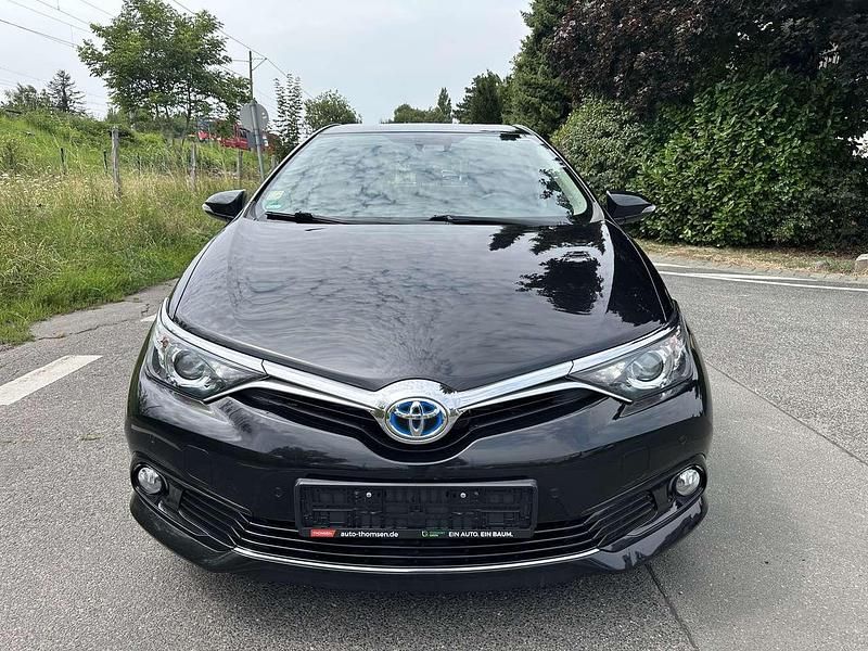 Schwarz Gebraucht 2016 Toyota Auris Hybrid Multidrive S Kleinwagen | 11.500 € - Bild 1/4