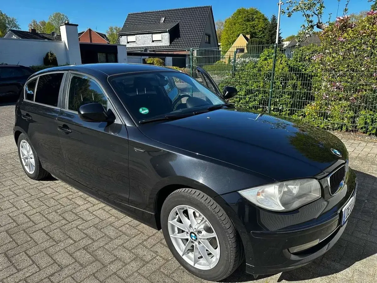 Gebraucht BMW 116 116 PS (85 kW) 2010 Schwarz Kleinwagen