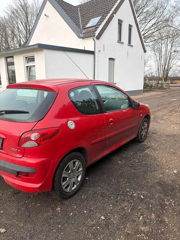 Gebraucht Peugeot 206+ 75 PS (55 kW) 2011 Rot Kleinwagen