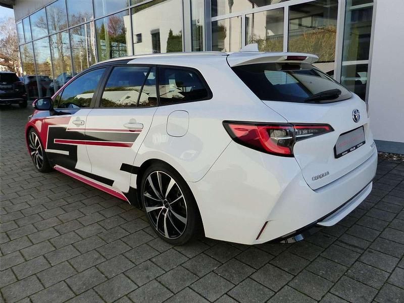 Gebraucht Toyota Corolla Business Edition 184 PS (135 kW) 2020 Schneeweiß 040 / folierung rot Kombi