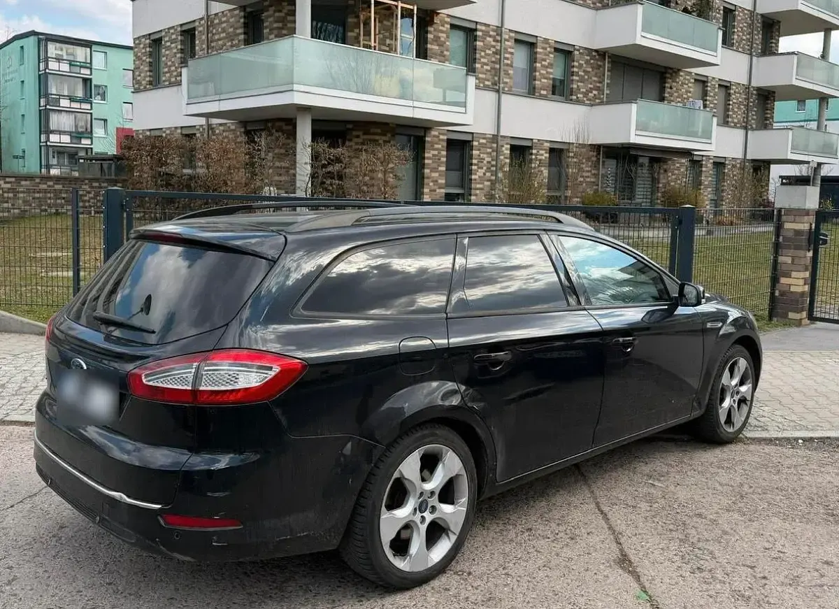 Używany Ford Mondeo 115 KM (84 kW) 2011 Czarny Kombi