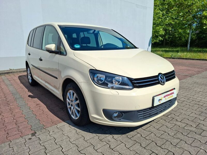 Gelb Gebraucht 2015 VW Touran Van / Kleinbus | 4.800 € - Bild 1/4