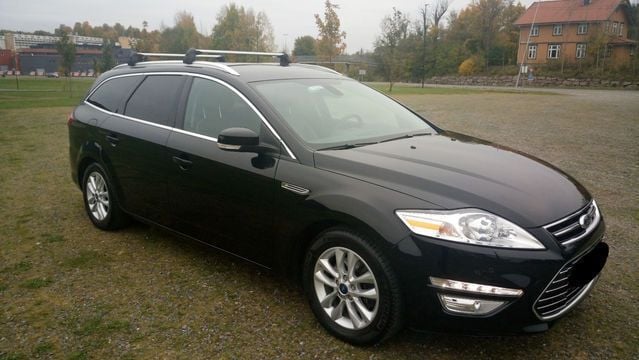 Używany Ford Mondeo Premium 163 KM (119 kW) 2012 Czarny Kombi